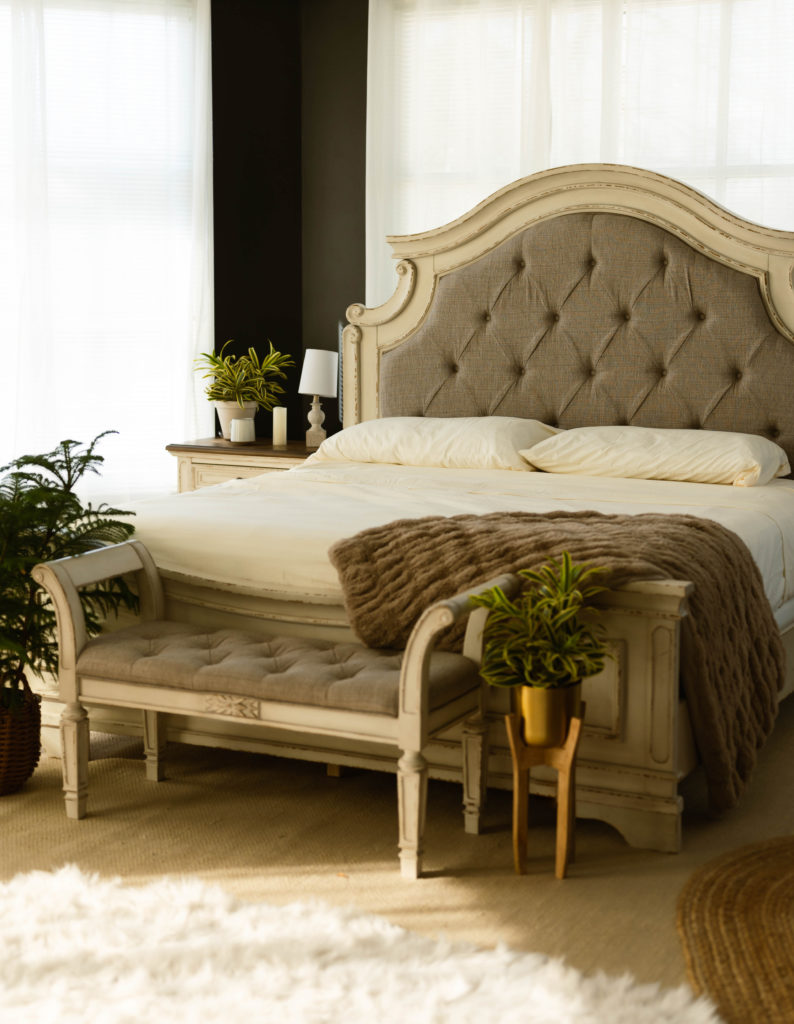 Large queen bed at a new studio for a boudoir photographer. 