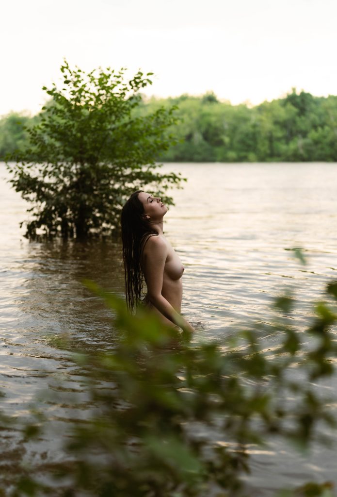 nude woman standing in the water for shoot with Richmond photographer tease by Hannah louise 