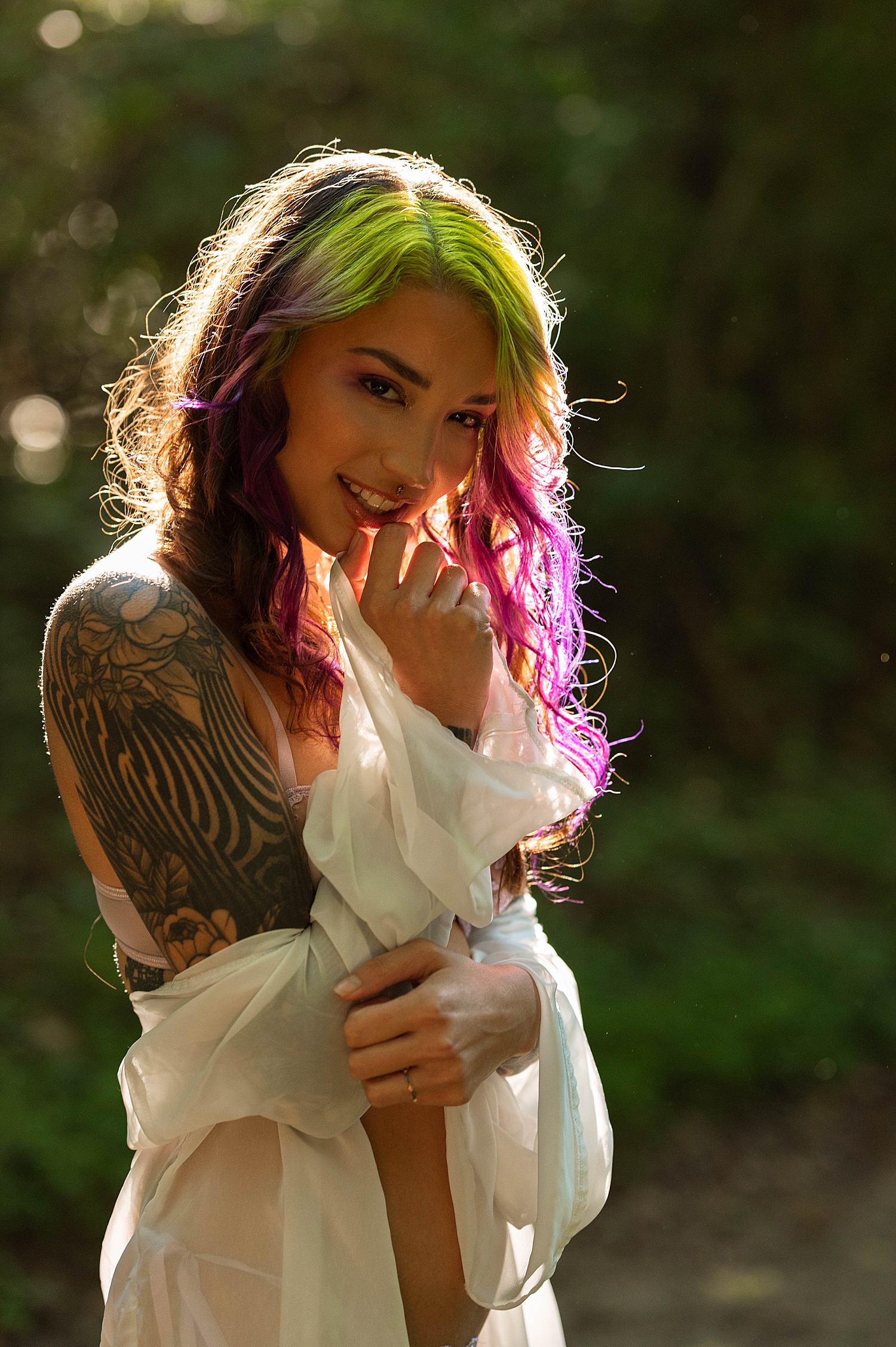 woman in forest with colorful hair by Richmond Boudoir Photographer