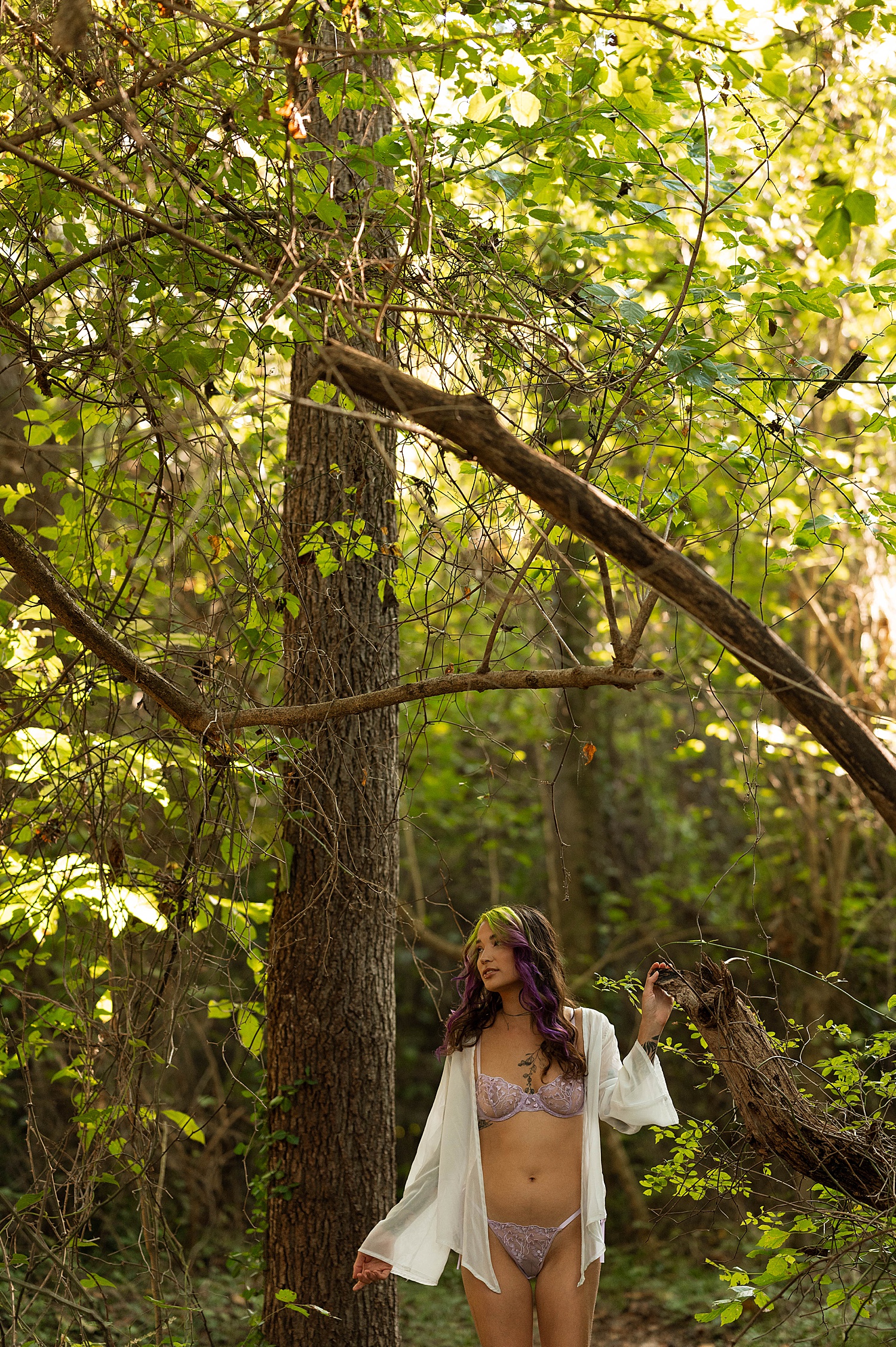 Brunette walking in the forest in lingerie by Richmond Boudoir Photographer