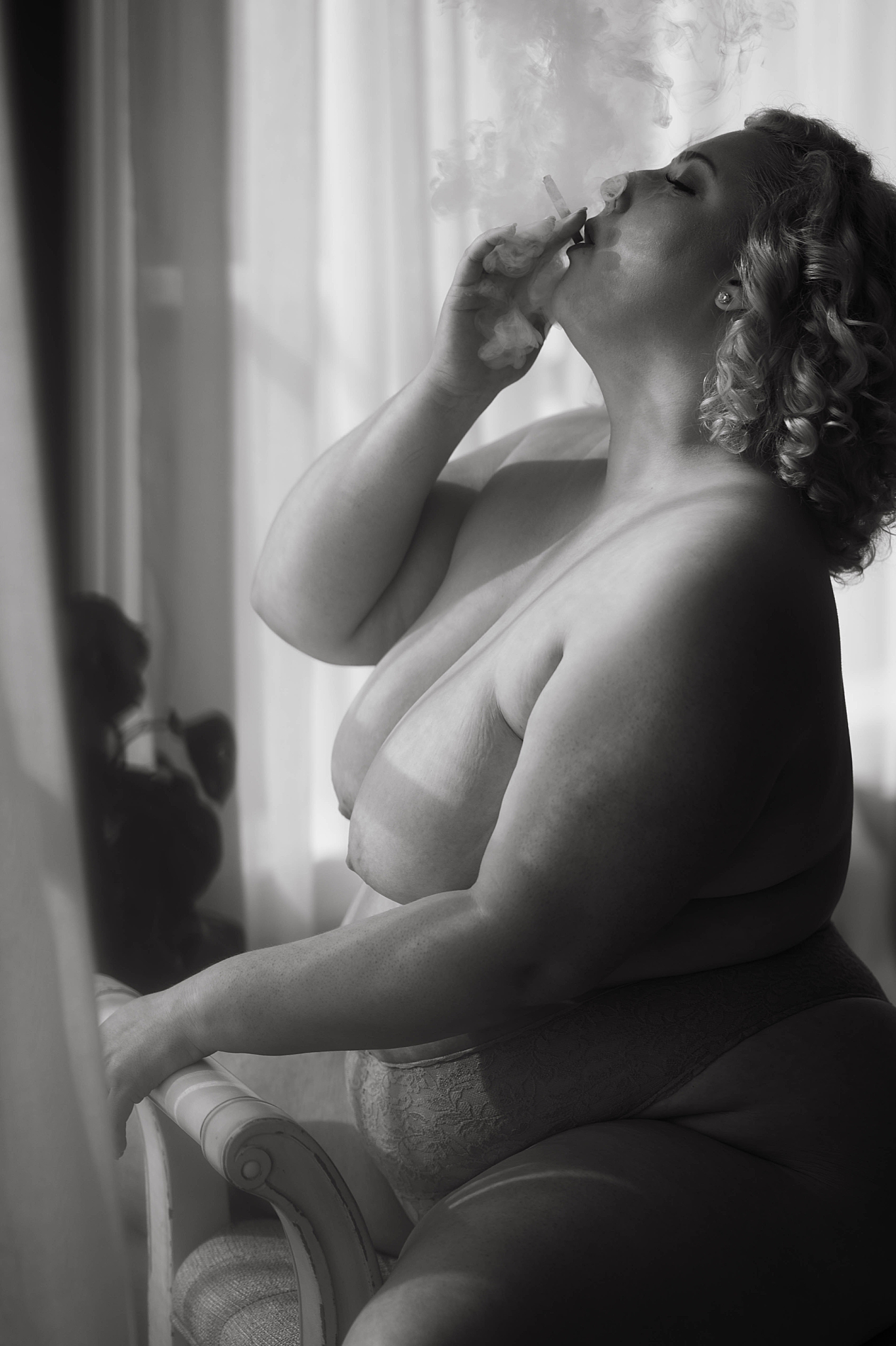 nude woman smokes for empowering birthday session