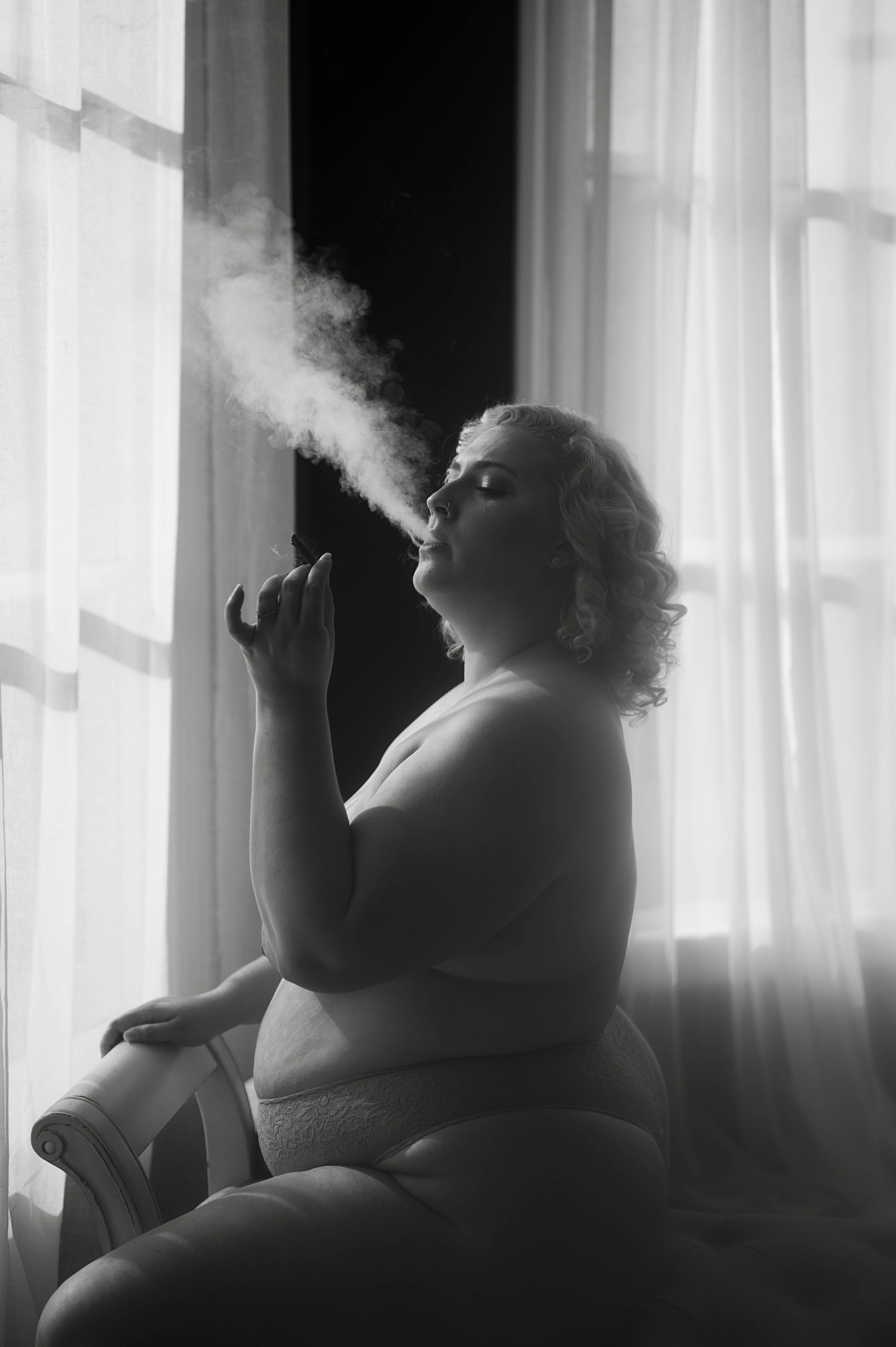 person on couch smokes for Tease by Hannah Louise